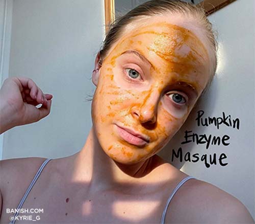 pumpkin mask skincare on woman's face 