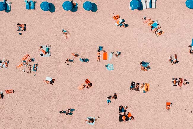 people on beach in summer