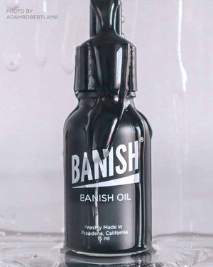 banish oil with water drops